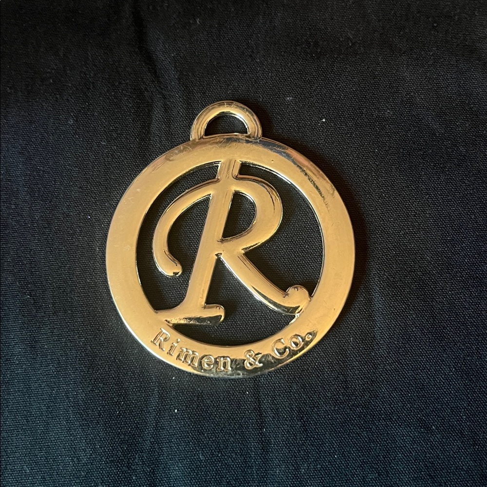 Rimen & Co.  Gold Tone purse Tag Used